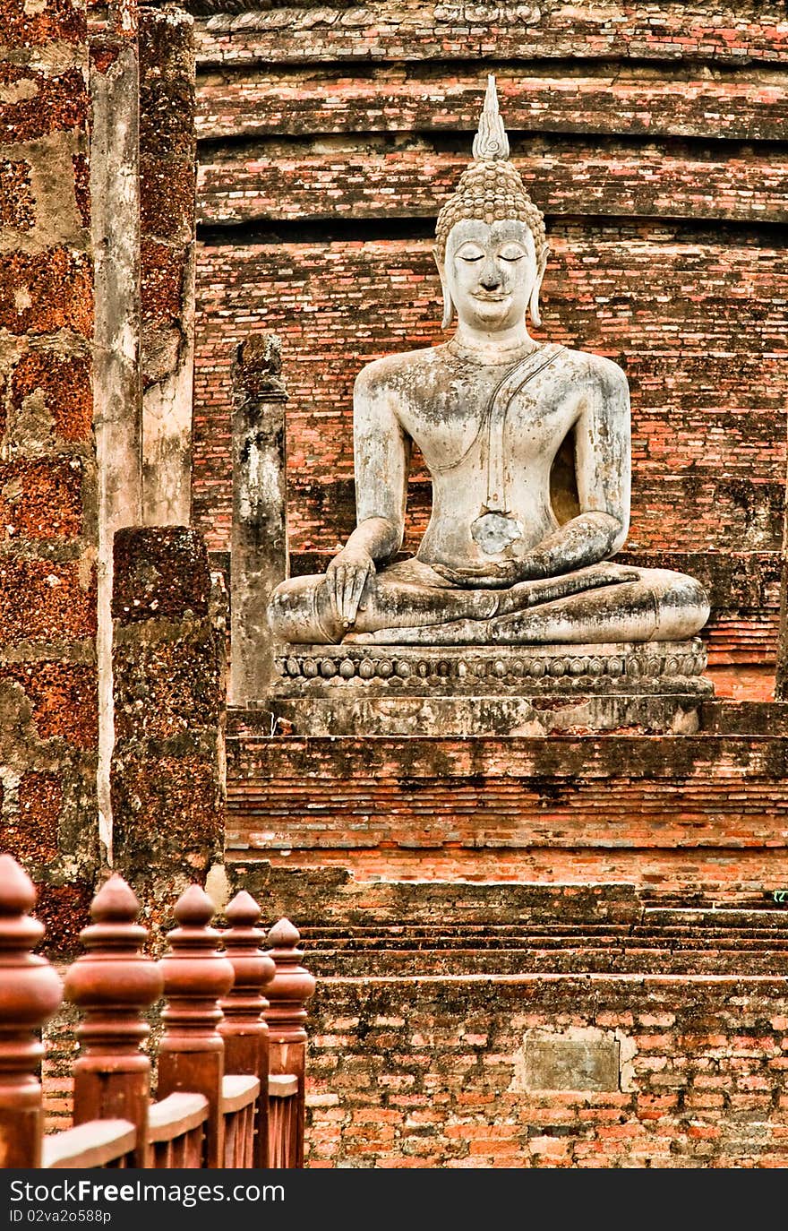 Buddha statue in the ruins of Sukhothai in Thailand