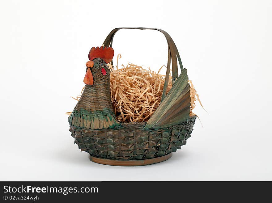 A basket with a chicken shape to it. A basket with a chicken shape to it.