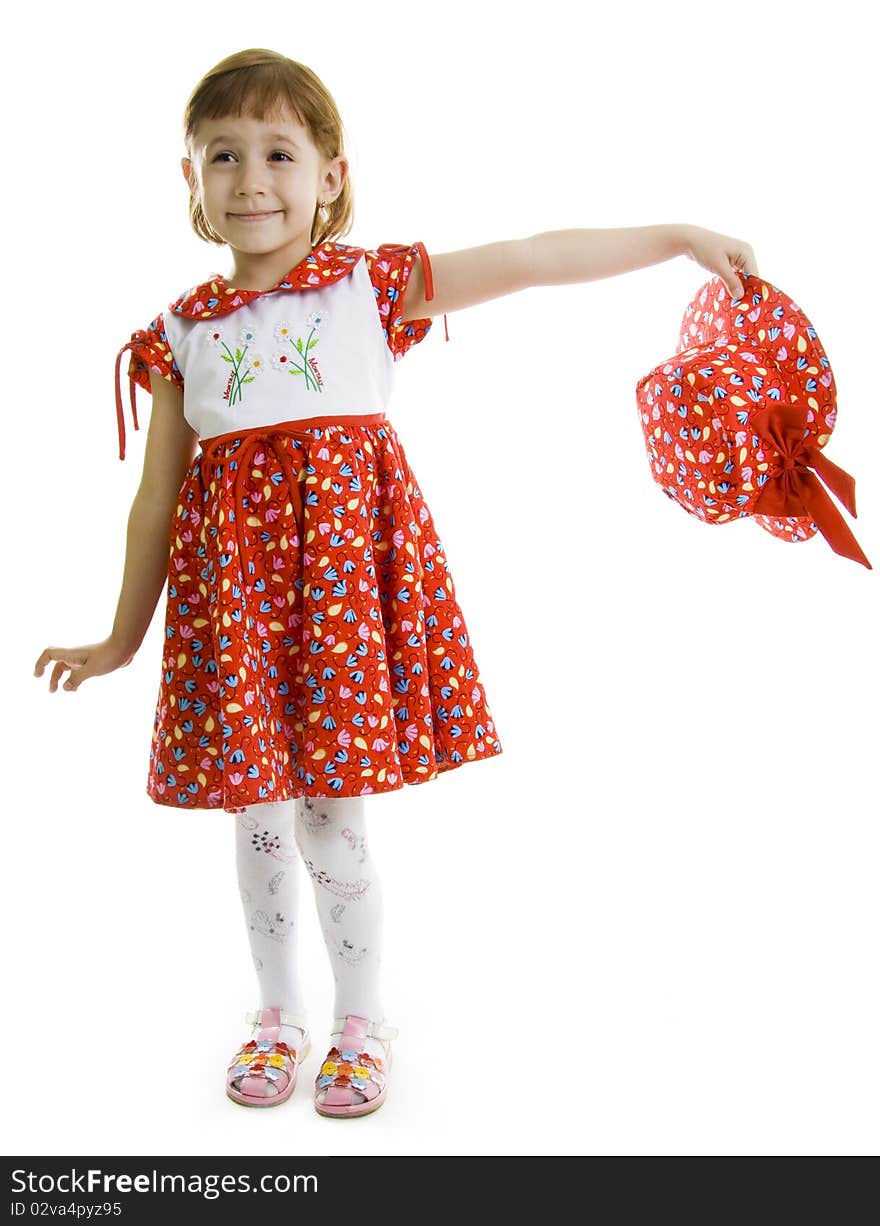 Little girl holds the hat in a hand. Isolated white. Little girl holds the hat in a hand. Isolated white.