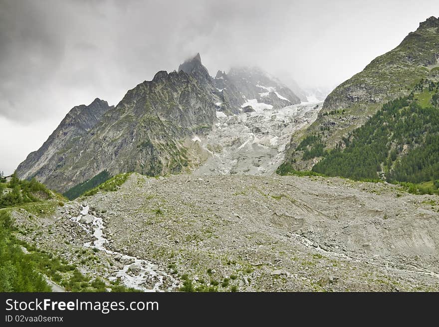 Foggy view of the Massif of Mont Blanc from the Italian. Foggy view of the Massif of Mont Blanc from the Italian