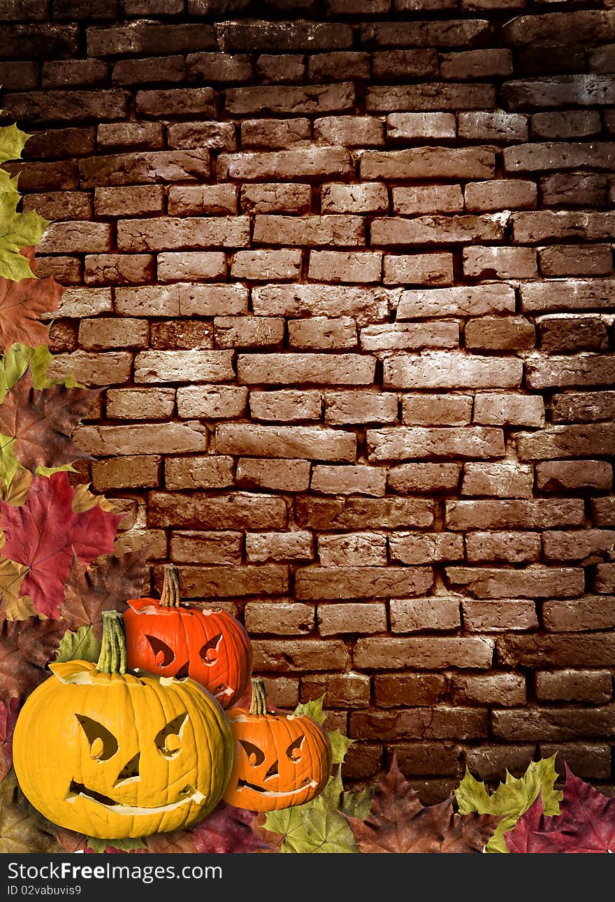 Fall leaves and carved pumpkins forming a frame for your text,