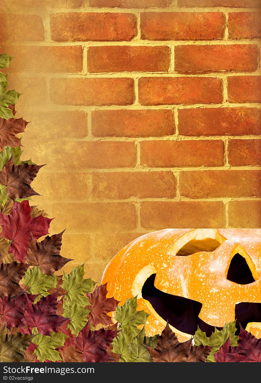 Fall leaves with pumpkin on wall Brick brown background