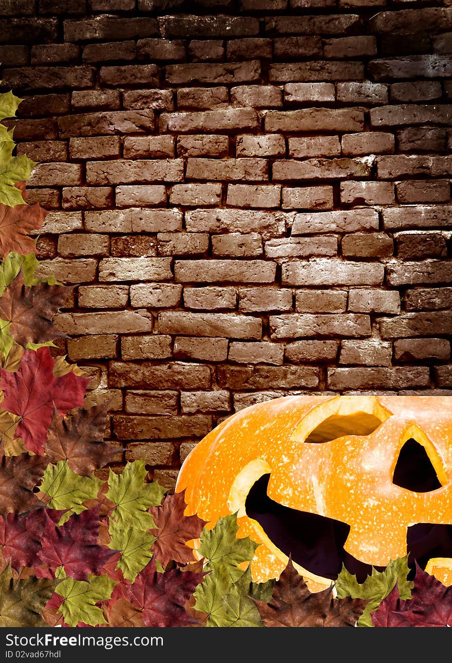 Fall leaves with pumpkin on wall Brick brown background. Fall leaves with pumpkin on wall Brick brown background