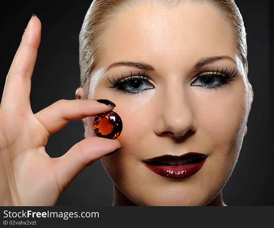 Fashion woman with bright make-up and jewel