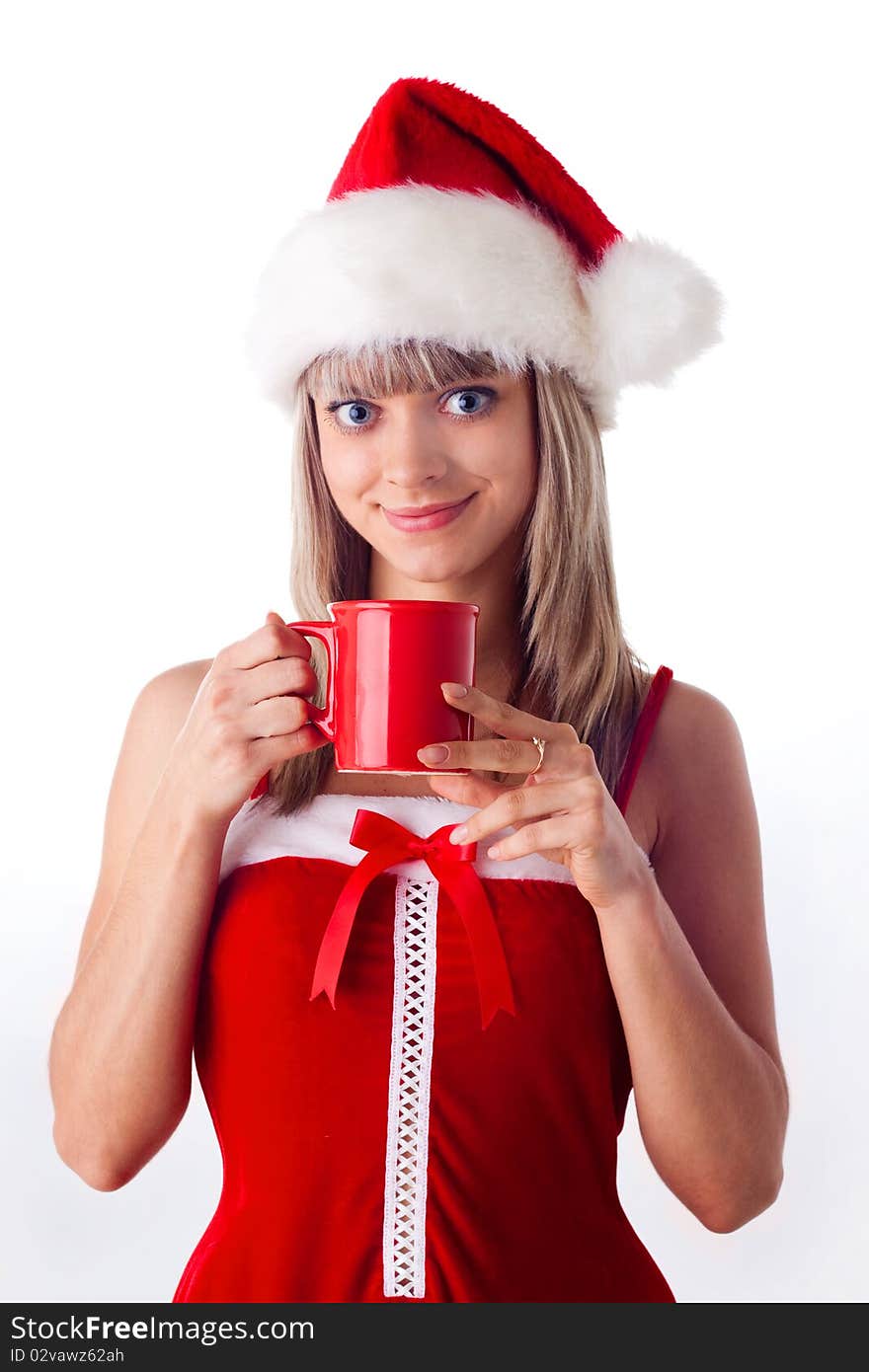 Santa girl holding a cup, drink. Holidays Christmas and New Year