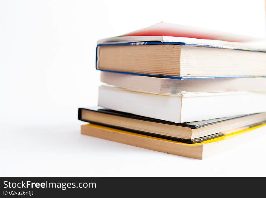 Pile of books on a white background