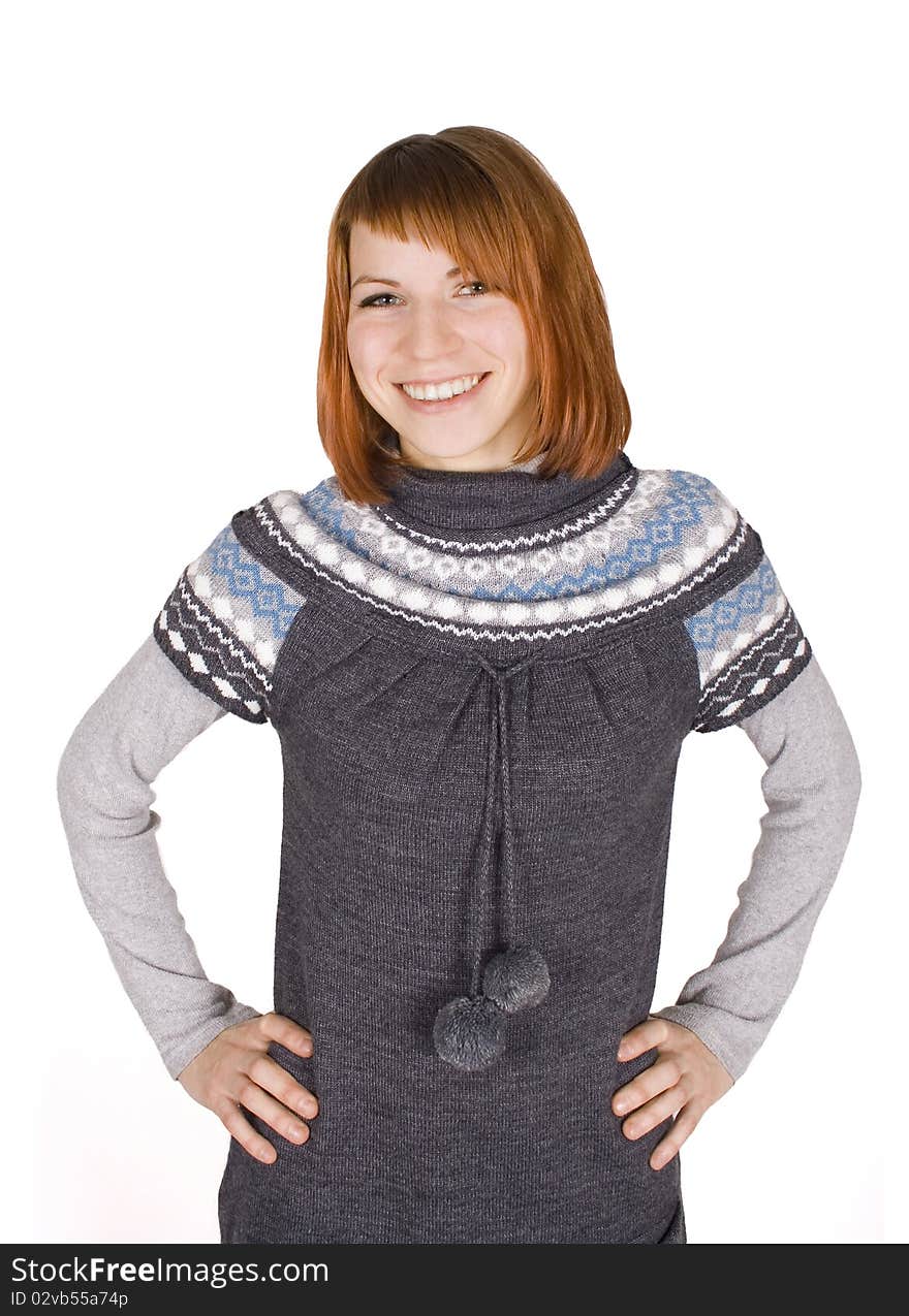 Girl in knit dress standing, hands on hips