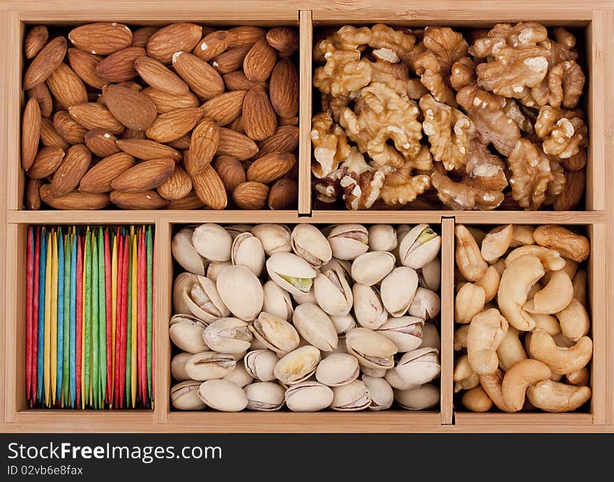 Nuts of different grades in a wooden box.