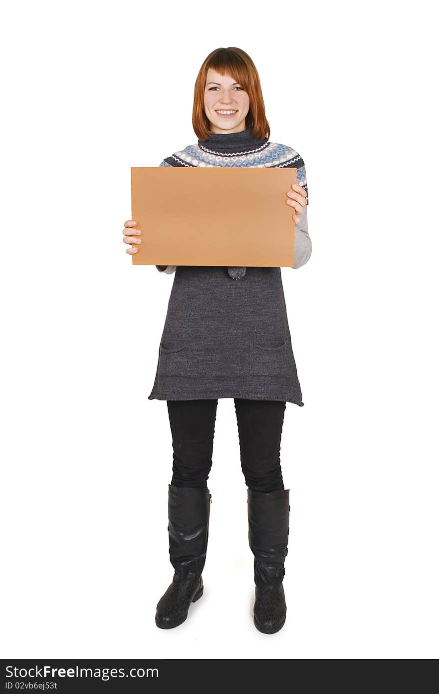 Girl standing and holding cardboard