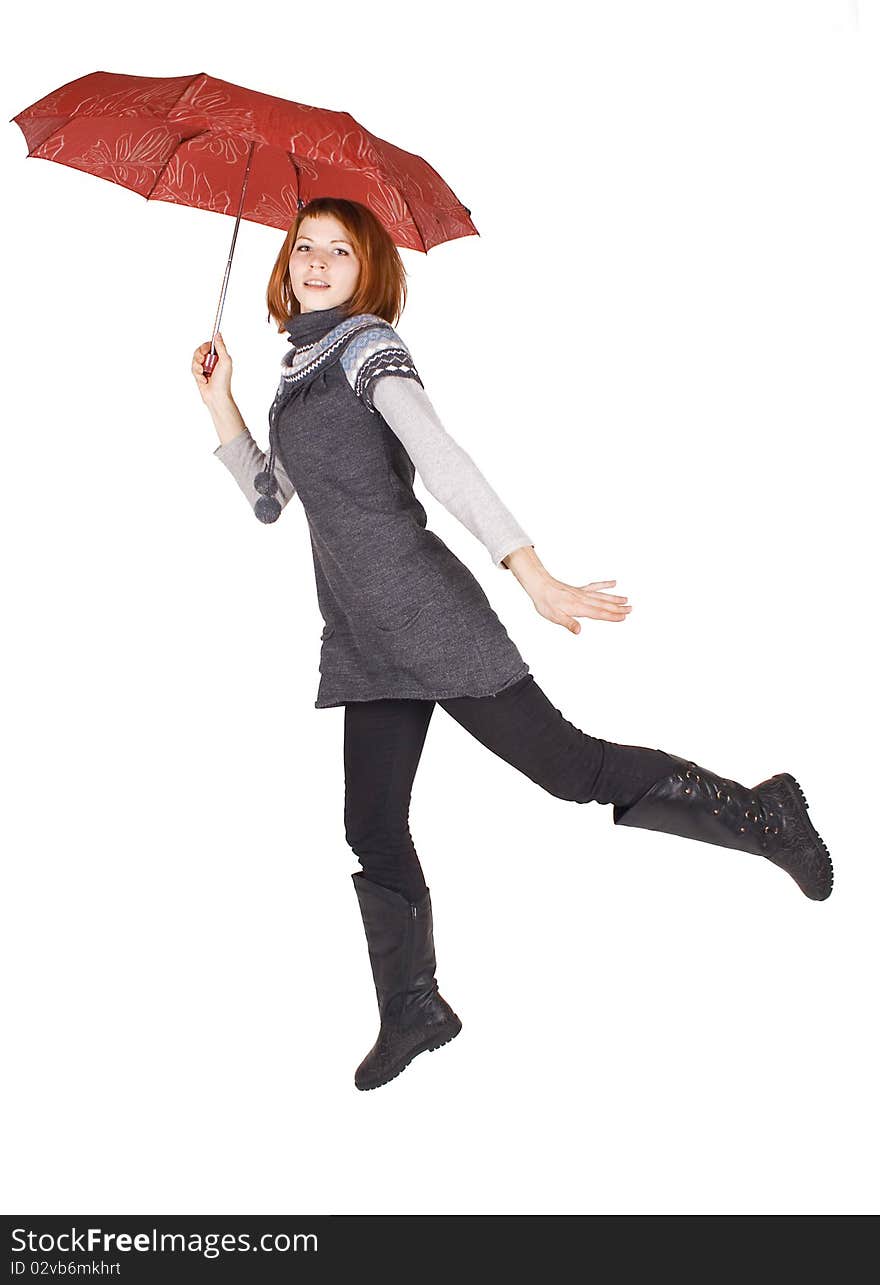 Young beautiful girl in knit dress holding red umbrella and jumping, isolated on white. Young beautiful girl in knit dress holding red umbrella and jumping, isolated on white