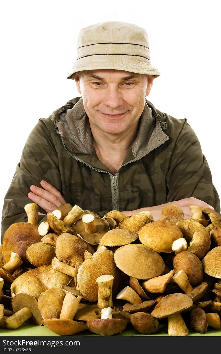 Habitual gatherer of mushrooms on white