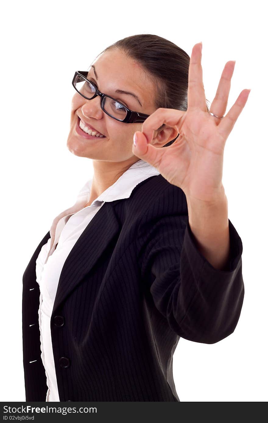 Attractive business woman satisfied with results - ok sign