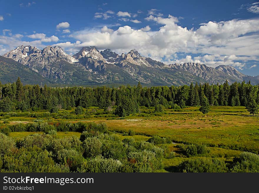 Clouds raking Grand Teton peak