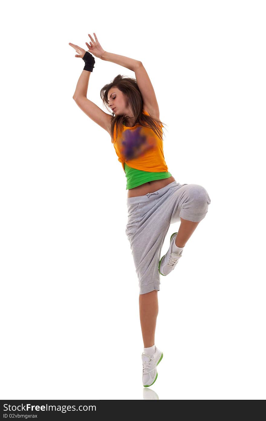 Beautiful modern ballet dancer posing on white background