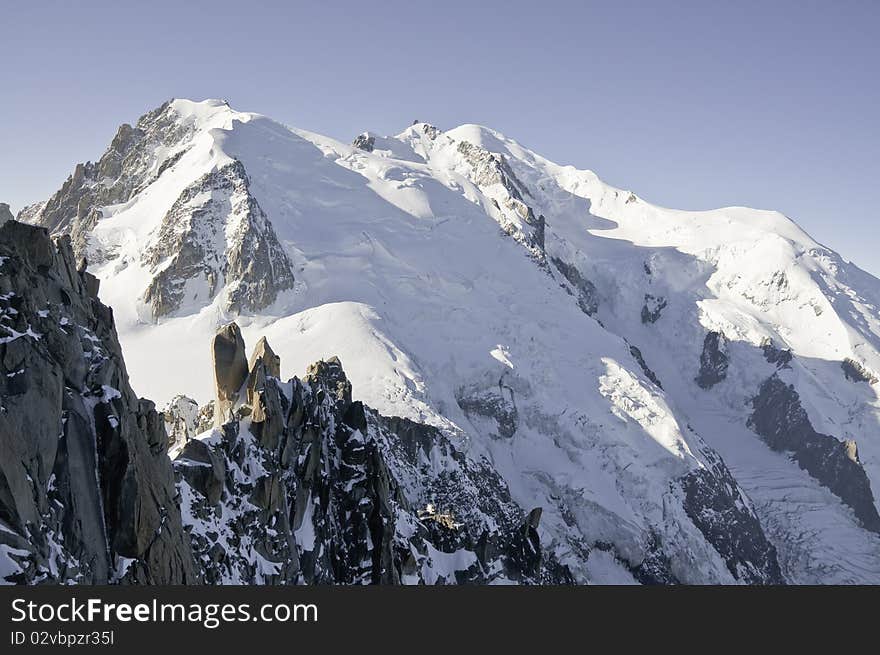 From the summit of l'Aiguille du Midi (3,842 m), the views of the Alps are spectacular. In this picture you can see the Mont-Blanc. Below on the right you can see the Glacier des Bossons. From the summit of l'Aiguille du Midi (3,842 m), the views of the Alps are spectacular. In this picture you can see the Mont-Blanc. Below on the right you can see the Glacier des Bossons