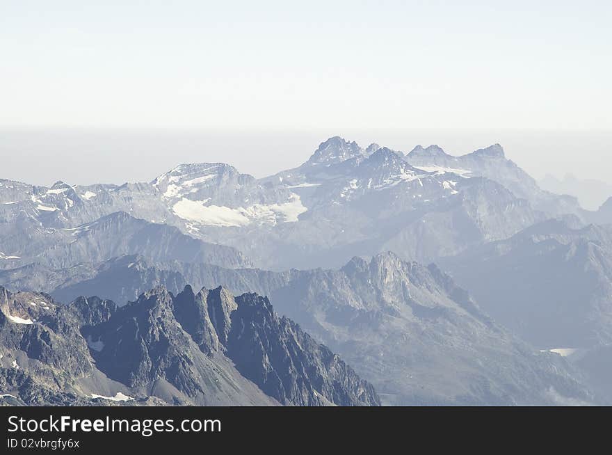 From the summit of l'Aiguille du Midi (3,842 m), the views of the Alps are spectacular. Views of Dents du Midi. From the summit of l'Aiguille du Midi (3,842 m), the views of the Alps are spectacular. Views of Dents du Midi