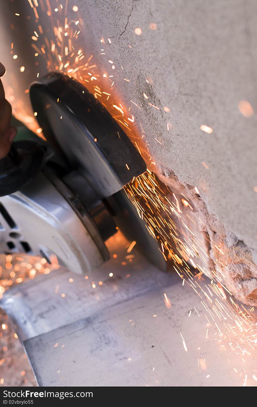 Male workers in the iron cut machine.