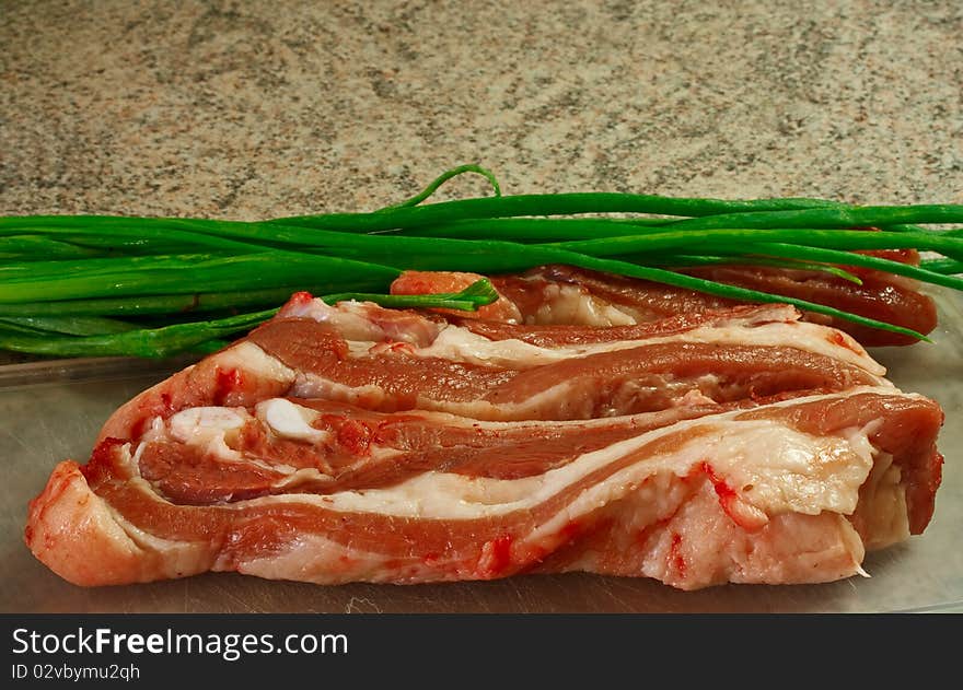 Raw meat with green onions