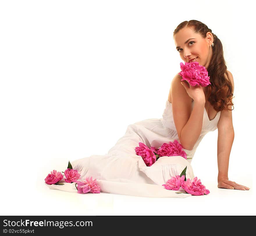 Beautiful young woman with pink flower isolated on white. Beautiful young woman with pink flower isolated on white