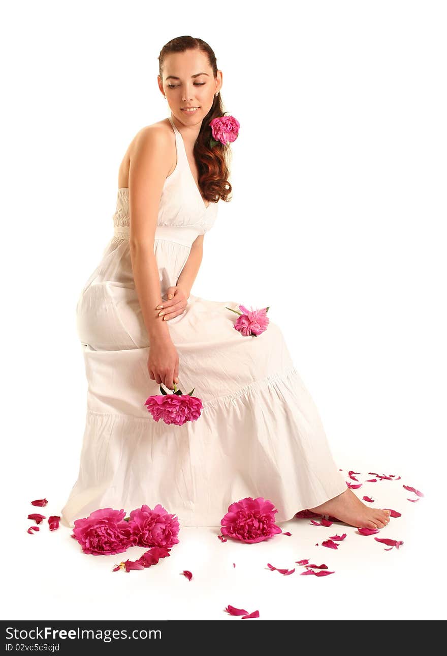 Beautiful young woman with pink flower isolated on white. Beautiful young woman with pink flower isolated on white