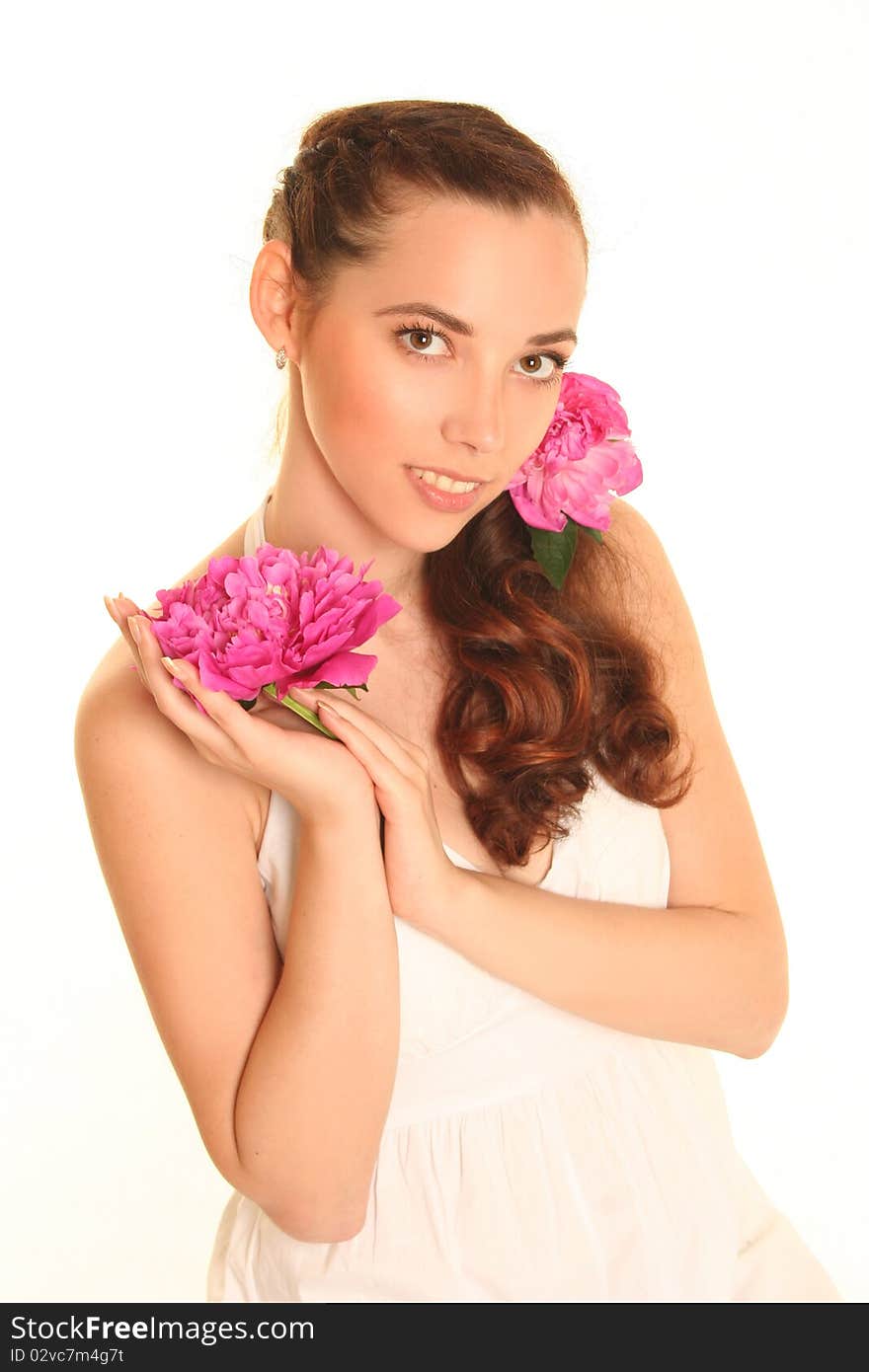 Beautiful young woman with pink flower isolated on white. Beautiful young woman with pink flower isolated on white