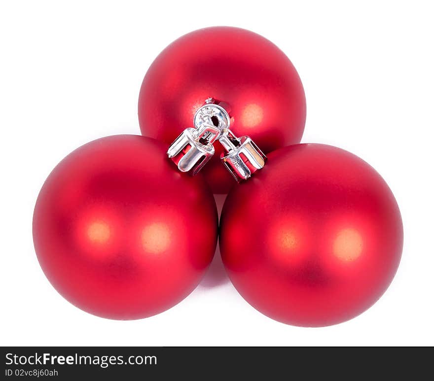 Three red christmas balls