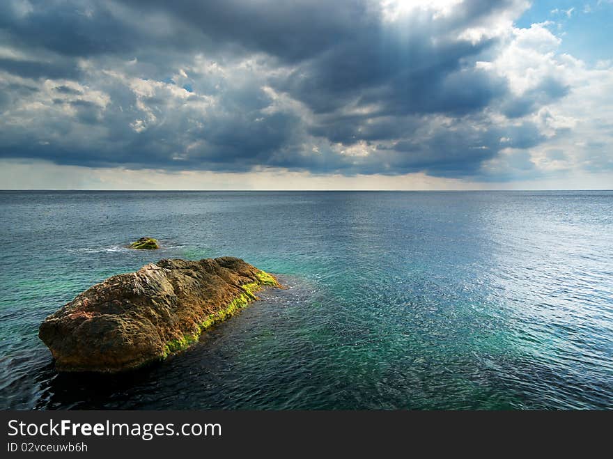 Heavy clouds on sea. Nature composition. Heavy clouds on sea. Nature composition.