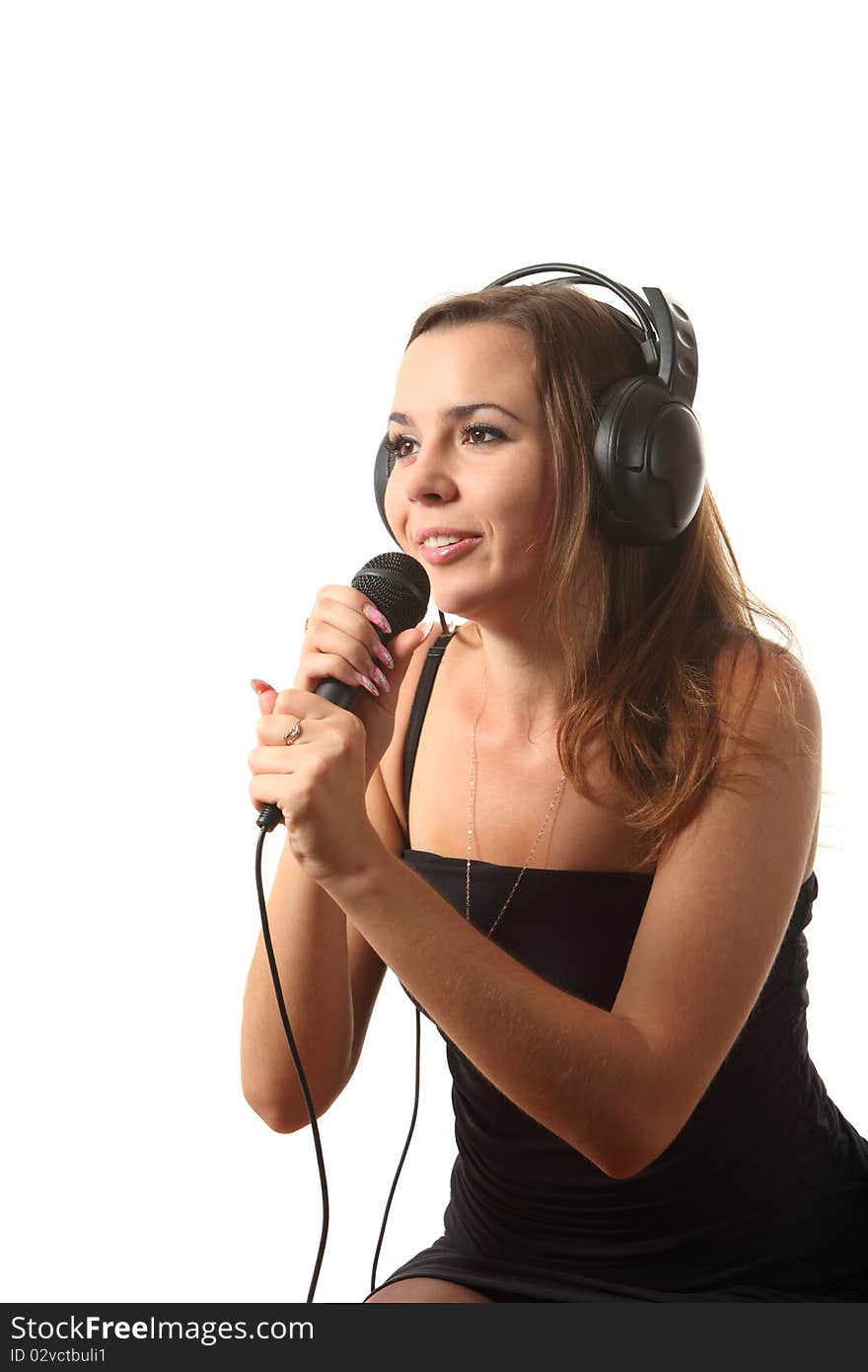 Young attractive girl on the white isolated background was singing. Young attractive girl on the white isolated background was singing.