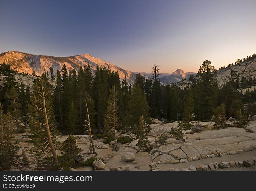 The vast beauty of the Yosemite mountains at sunset in the Yosemite National Park in California. The vast beauty of the Yosemite mountains at sunset in the Yosemite National Park in California