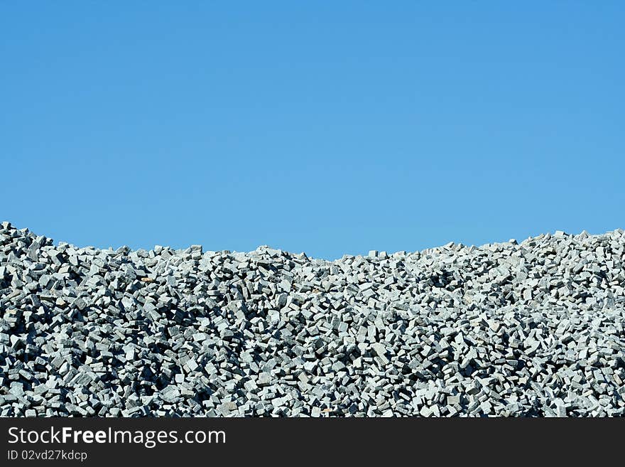 Granite Stone Pile With Blue Sky