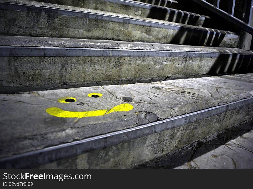 Graffiti Smile on the ladder side walkpath