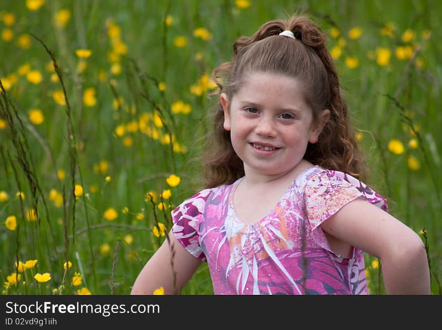 Beautiful young girl in a field of yellow flowers. Beautiful young girl in a field of yellow flowers