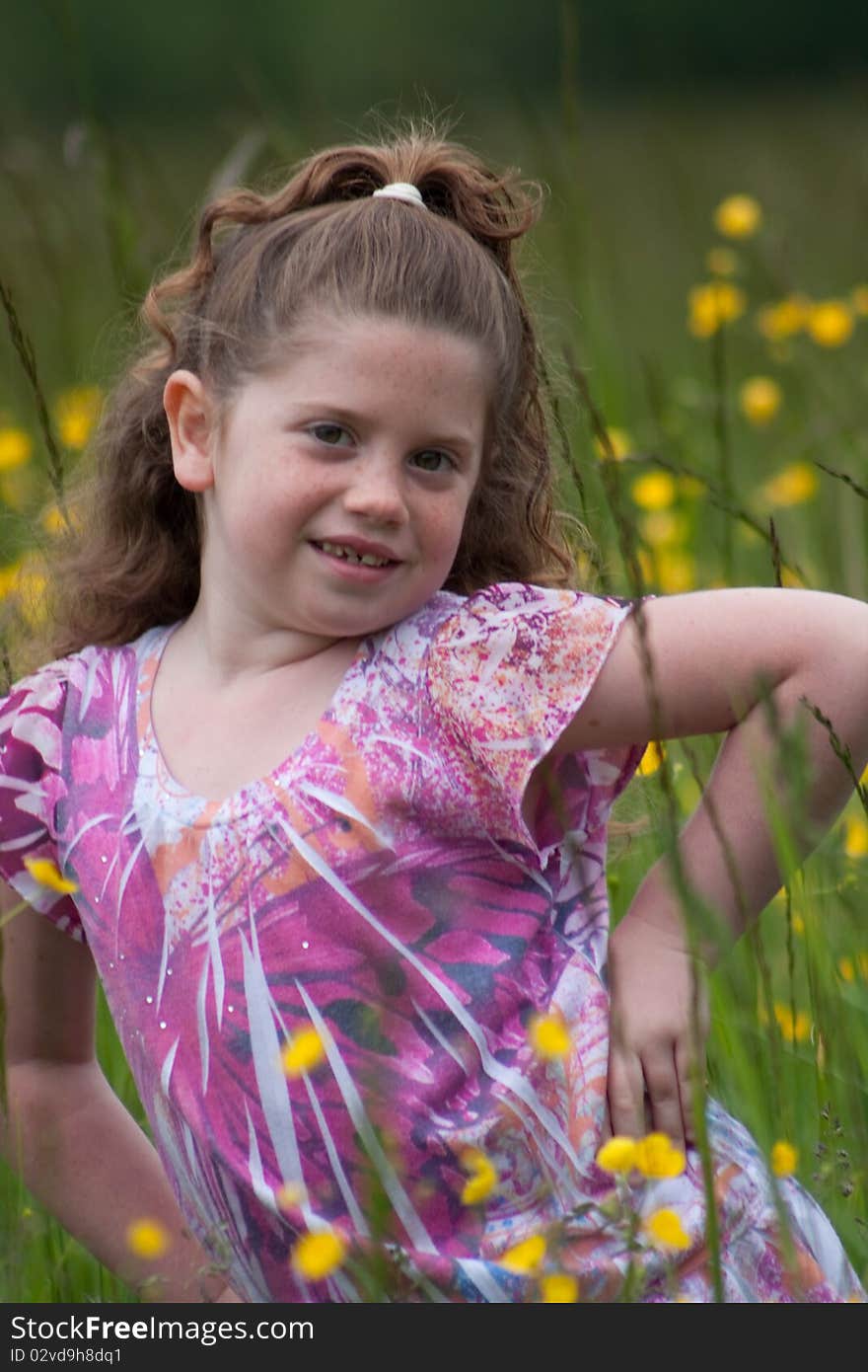 Beautiful young girl in a field of yellow flowers. Beautiful young girl in a field of yellow flowers