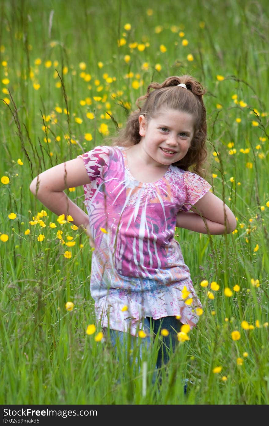 Beautiful young girl in a field of yellow flowers. Beautiful young girl in a field of yellow flowers