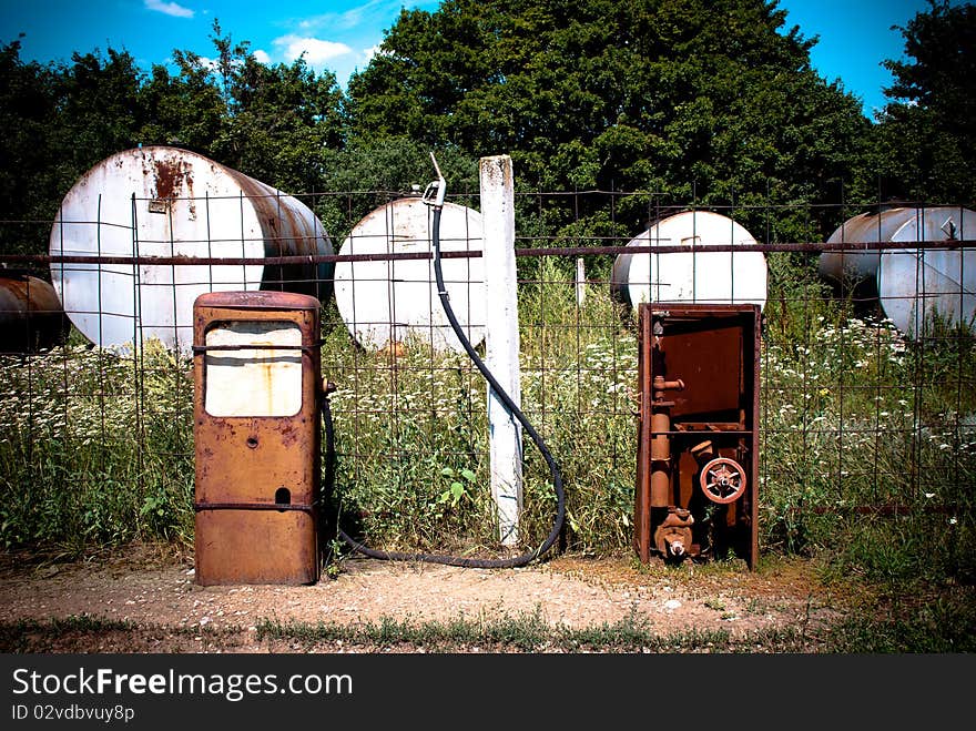 Old rusty gas station outdoors. Old rusty gas station outdoors