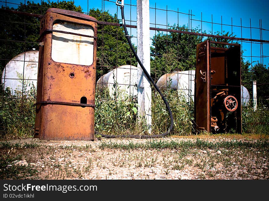 Old rusty gas station outdoors. Old rusty gas station outdoors