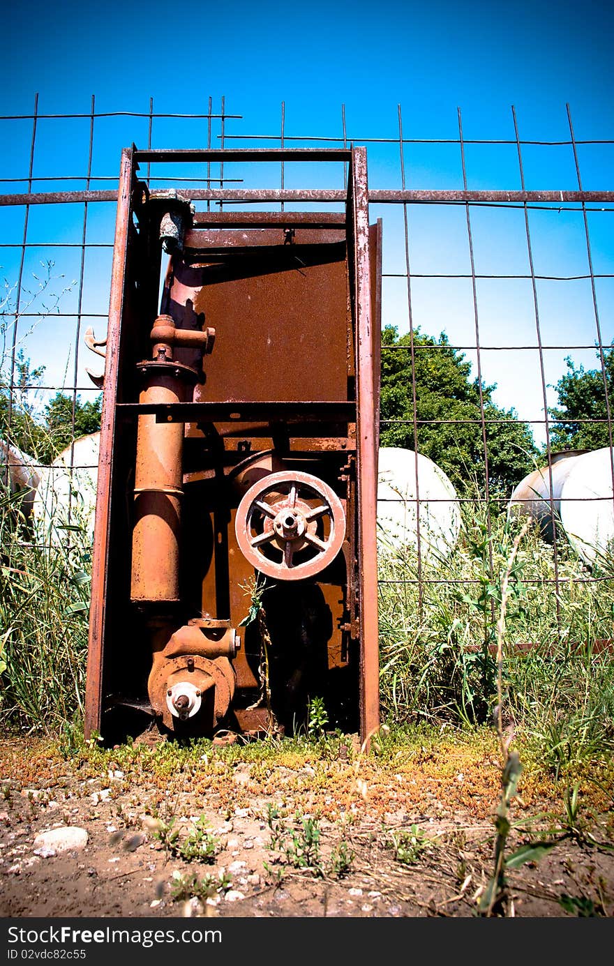 Old rusty gas station outdoors. Old rusty gas station outdoors