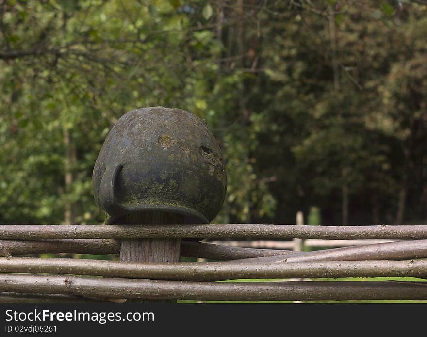 Ceramic pot on the wicker fence