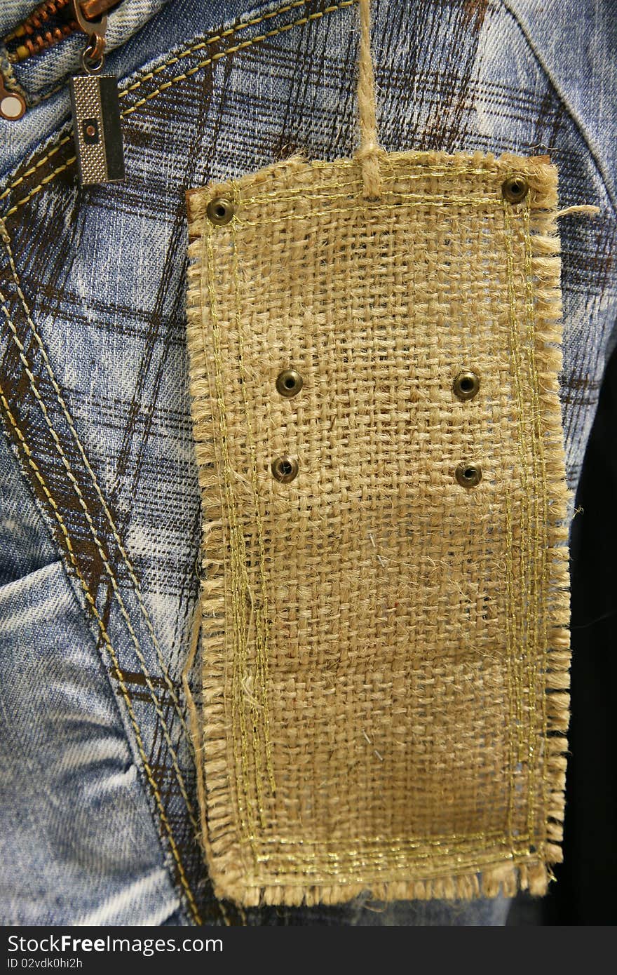 Close-up of cotton jeans with label