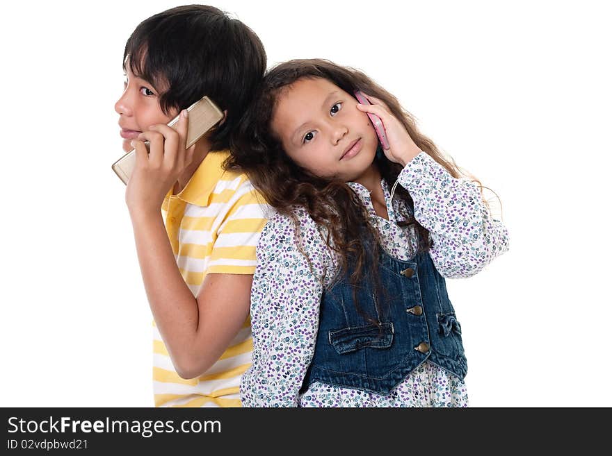 Cellphone, portrait of two children talkind with mobilephone against white background