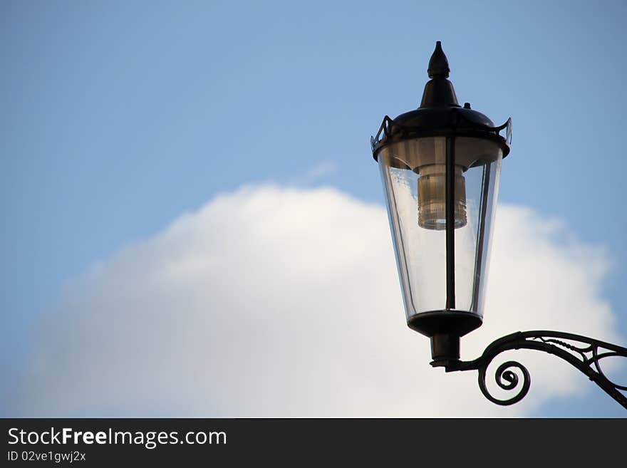 Street lamp contast with blue sky