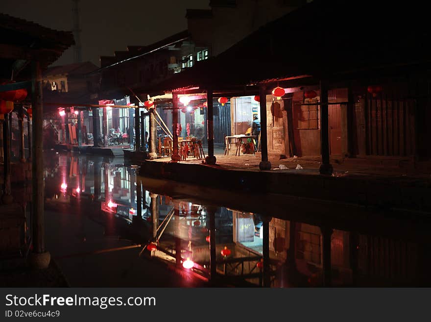 This is the nightscop of An chang town Zhejiang province china .beautiful inverted reflection in water. This is the nightscop of An chang town Zhejiang province china .beautiful inverted reflection in water