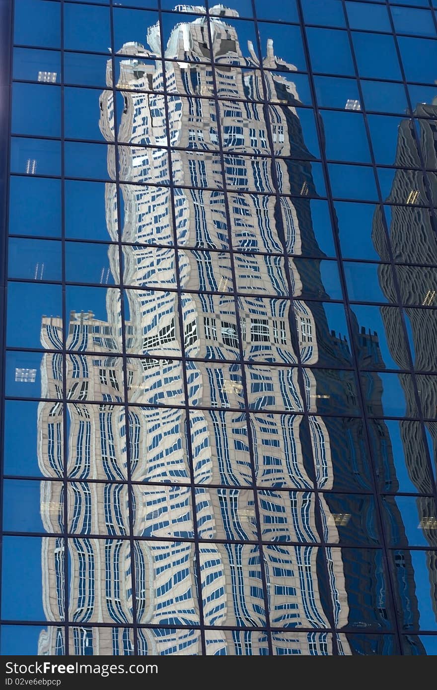 Reflection of a skyscraper in another. Reflection of a skyscraper in another