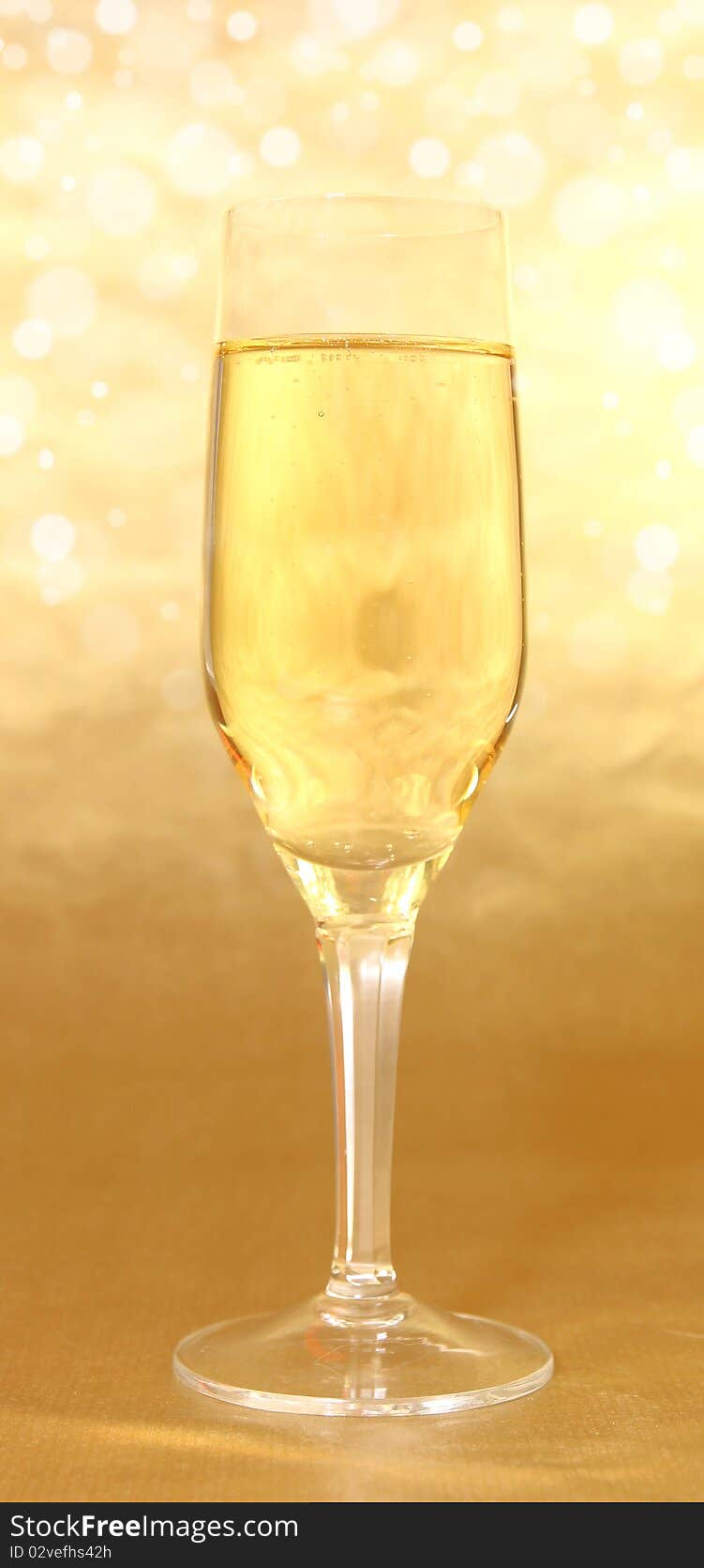 Studio photo of champagne glasse on gold background. Studio photo of champagne glasse on gold background