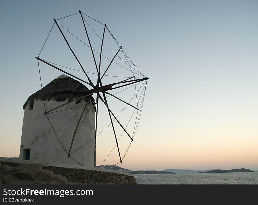 The iconic old Santorini windmills which are located at the perfect spot to take in the sunset