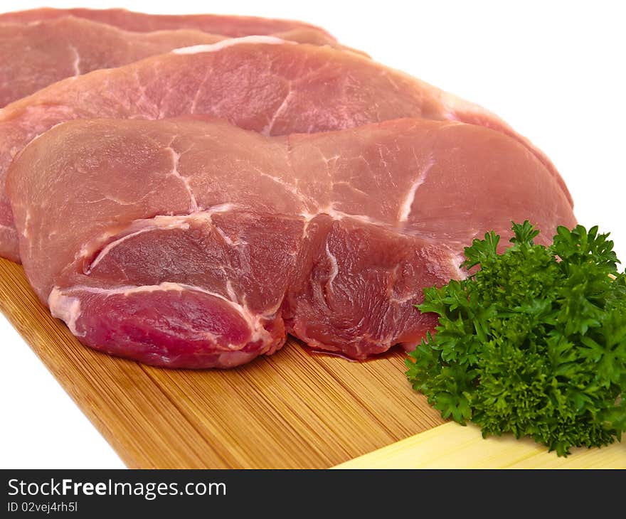 Fresh porc cuts closeup view on pure white background