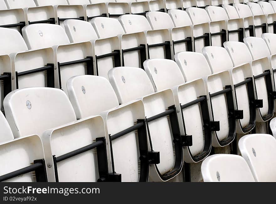 Rows of seats with no smoking signs on their backs