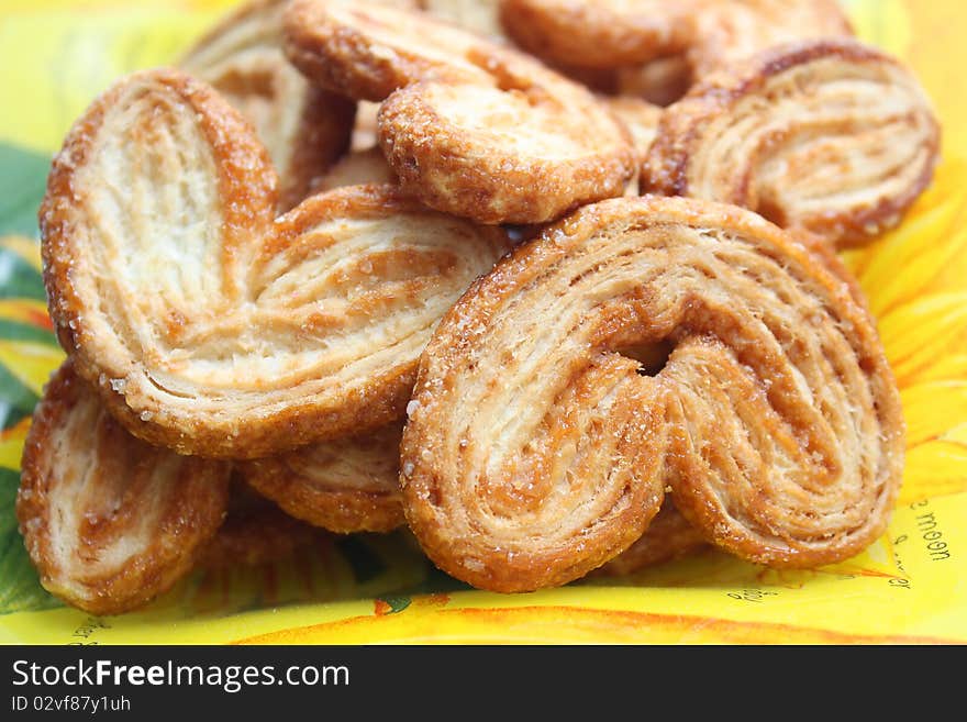 Dutch cookie on yellow plate