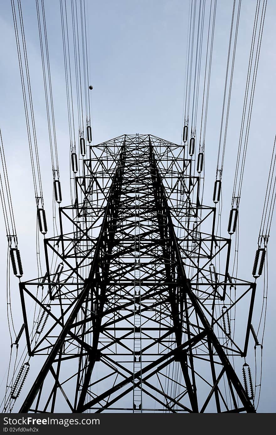 Electric high voltage post with the sky background