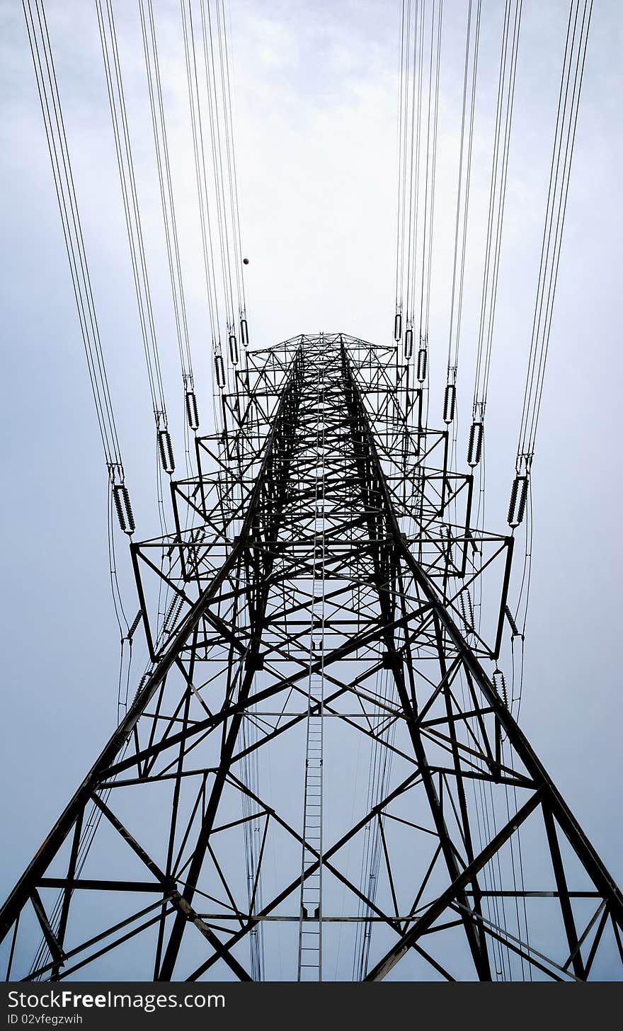 Electric high voltage post with the sky background